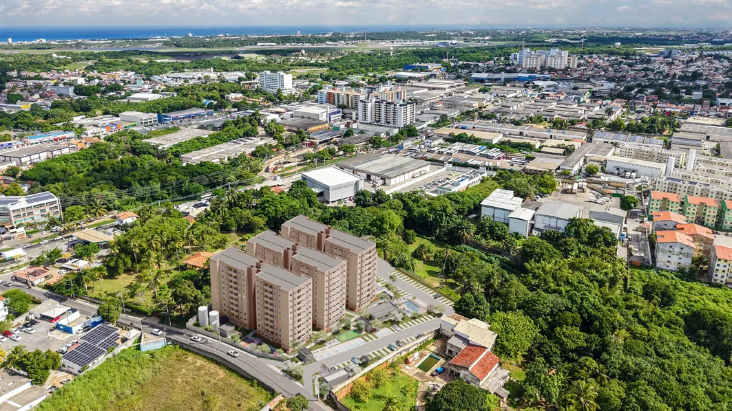 Perspectiva aérea ilustrativa dos três blocos do Vila Santiago e do seu entorno no Recreio Ipitanga